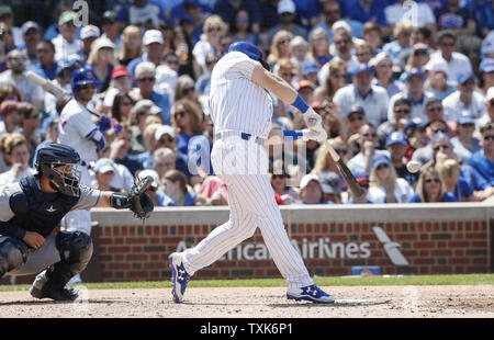 Chicago Cubs Ian Happ hits two-run home run against the San Diego Padres in the fourth inning at Wrigley Field on June 21, 2017 in Chicago. Photo by Kamil Krzaczynski/UPI Stock Photo