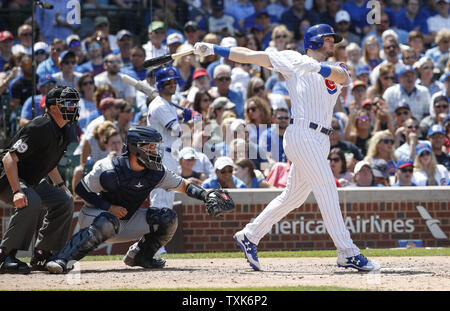 Chicago Cubs Ian Happ hits two-run home run against the San Diego Padres in the fourth inning at Wrigley Field on June 21, 2017 in Chicago. Photo by Kamil Krzaczynski/UPI Stock Photo
