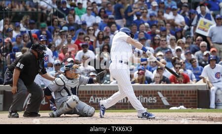 Chicago Cubs Ian Happ hits a single off Tampa Bay Rays Erasmo Ramirez in the sixth inning at Wrigley Field on July 5, 2017 in Chicago. Photo by Kamil Krzaczynski/UPI Stock Photo