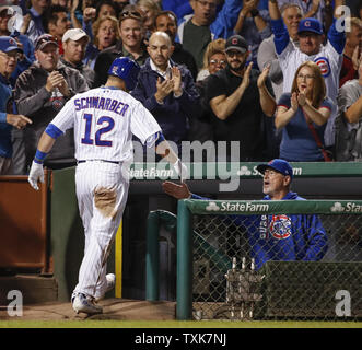 New York Mets pitcher John Maine watches the Colorado Rockies take batting  practice at Coors Field in Denver August 29, 2006. (UPI Photos/Gary C.  Caskey Stock Photo - Alamy