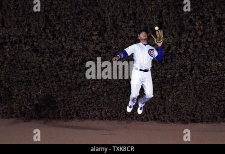 Chicago Cubs center fielder Albert Almora Jr. catches a fly ball hit by Los Angeles Dodgers' Chris Taylor during the first inning of game 4 of the NLCS at Wrigley Field on October 18, 2017 in Chicago.     Photo by Brian Kersey/UPI Stock Photo