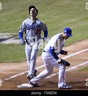 Los Angeles Dodgers' Cody Bellinger (L) and Chicago Cubs first baseman Anthony Rizzo react after Bellinger hit into a double play in the ninth inning to end game 4 of the NLCS at Wrigley Field on October 18, 2017 in Chicago. The Cubs defeated the Dodgers 3-2 but trail 3-1 in the best of seven series.     Photo by Brian Kersey/UPI Stock Photo