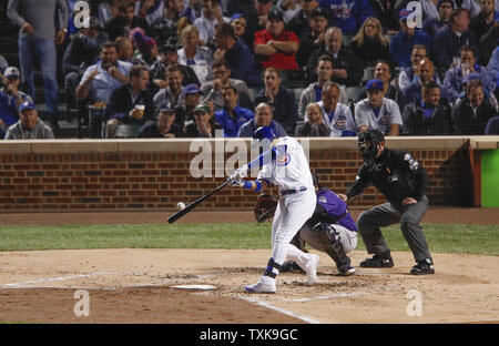 Chicago Cubs center fielder Albert Almora Jr. (5) singles against the Colorado Rockies in the second inning of a National League Wild Card game at Wrigley Field on October 2, 2018 in Chicago. Photo by Kamil Krzaczynski/UPI Stock Photo