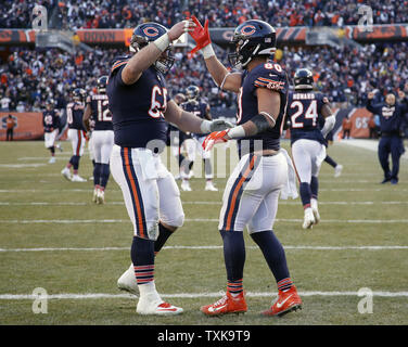 Chicago Bears center Cody Whitehair (65) huddles with teammates against the  New York Giants during an NFL football game Sunday, Oct. 2, 2022, in East  Rutherford, N.J. (AP Photo/Adam Hunger Stock Photo - Alamy