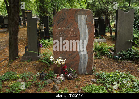 Grave of Czech ice hockey player and coach Ivan Hlinka (1950 - 2004) at Olšany Cemetery in Prague, Czech Republic. Stock Photo