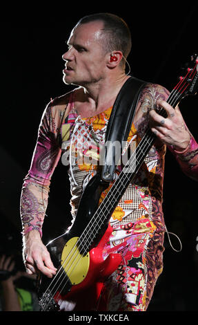 Red Hot Chili peppers guitarist, Flea, entertains the crowd between races at the NASCAR NEXTEL Challenge at Lowe's Motor Speedway in Charlotte, NC on May 20, 2006.  (UPI Photo/Bob Carey) Stock Photo