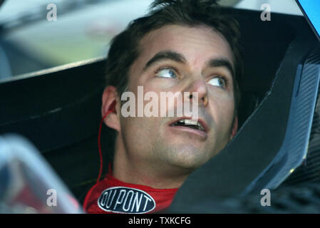Race car driver Jeff Gordon sits in his car after qualifying for the Coca-Cola 600 at the Lowe's Motor Speedway in Charlotte, N.C., on May 20, 2006. (UPI Photo/Nell Redmond) Stock Photo