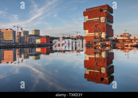 Antwerp, Belgium - April 5: Museum aan de Stroom (Museum on the stream, or simply MAS) bathing in the golden light of the sunset in Antwerp, Beligum o Stock Photo