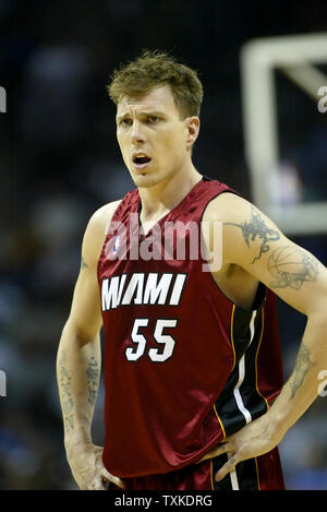 Miami Heat guard Jason Williams stares at an official after being charged with a foul as the Heat play the Charlotte Bobcats in the second half at the Charlotte Bobcats Arena in Charlotte, N.C. on April 10, 2007. Charlotte won 92-82. (UPI Photo/Nell Redmond) Stock Photo