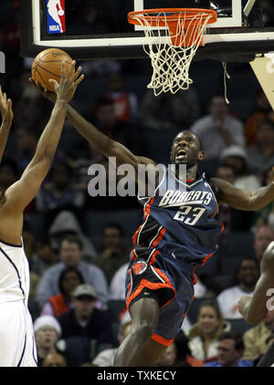 Charlotte Bobcats guard Jason Richardson (23) drives the baseline to score against the Utah Jazz in the second half at the Bobcats Arena in Charlotte, North Carolina on December 19, 2007. Charlotte won 98-92.(UPI Photo/Nell Redmond) Stock Photo