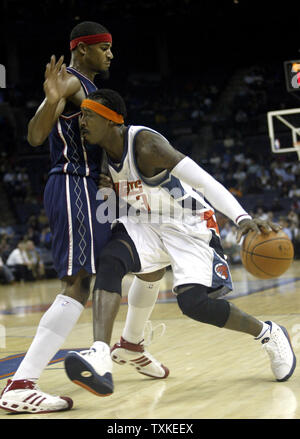 Charlotte Bobcats guard Gerald Wallace, right, collides with New Jersey Nets forward Sean Williams in the first half at the Charlotte Bobcats Arena in Charlotte, North Carolina on January 8, 2008. (UPI Photo/Nell Redmond) Stock Photo