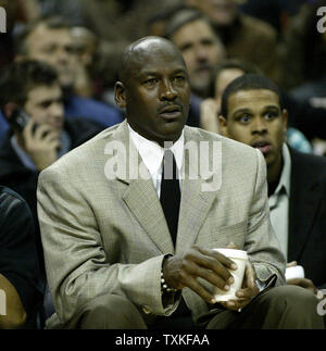 Charlotte Bobcats part owner and managing member of basketball operations Michael Jordan watches his Charlotte Bobcats as they defeat the Boston Celtics 114-106 in overtime in Charlotte, North Carolina on January 6, 2009. (UPI Photo/Nell Redmond) Stock Photo