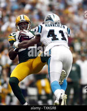 Carolina Panthers Cornerback Captain Munnerlyn (41) Breaks Up A Pass 