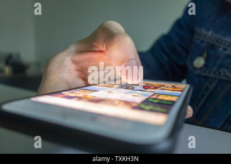 Operating the phone with one hand Stock Photo