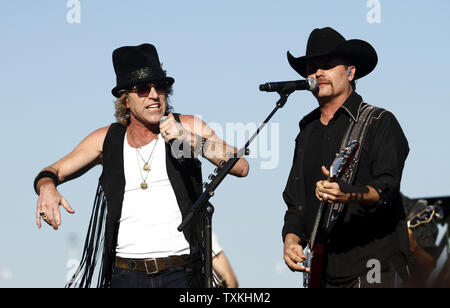 Big Kenny Alphin, left, and John Rich, the country music duo Big & Rich, perform at the Charlotte Motor Speedway before the  Bank of America 500 NASCAR Race in Concord, North Carolina on October 13, 2012.    UPI/Nell Redmond. Stock Photo