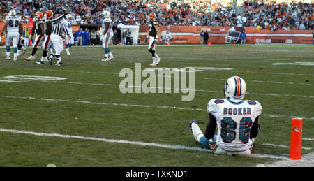 Miami Dolphins wide receiver Marty Booker, left, hauls in a five-yard  touchdown pass as Chicago Bears safety Todd Johnson (35) defends during the  second quarter at Soldier Field in Chicago on November