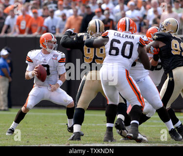 Cleveland Brown QB Charlie Frye is grabbed by New Orleans Saint