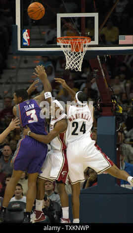 Cleveland Cavaliers Daniel Gibson (1) and Donyell Marshall (24) and Phoenix Suns Boris Diaw (3) jump for a rebound at the Quicken Loans Arena in Cleveland, Ohio, January 28, 2007. The Suns beat the Cavs 115-100.  (UPI Photo/ Stephanie Krell) Stock Photo