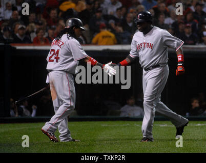 Boston Red Sox's Manny Ramirez congratulates David Ortiz (R) after Ortiz connected for a home run in the sixth inning of game four of the American League Championship Series at Jacobs Field in Cleveland on October 16, 2007. (UPI Photo/Kevin Dietsch) Stock Photo