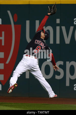 Chicago Cubs Addison Russell makes a catch on a pop up off the bat of St.  Louis Cardinals Magneuris Sierra while Javier Baez waits as a backup in the  sixth inning at