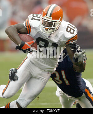 Cleveland Browns wide receiver Antonio Bryant (81) evades a tackle from Miami  Dolphins safety Lance Schulters (30) in the third quarter Nov. 20, 2005, at  Cleveland Browns Stadium. The Browns defeated the