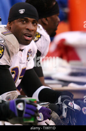 Baltimore Ravens cornerback Deion Sanders lines up against the