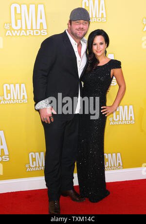 Lee Brice and his wife Sara arrive on the red carpet for the 2012 Country Music Awards at the Bridgestone Arena in Nashville on November 1, 2012.  UPI/Terry Wyatt Stock Photo