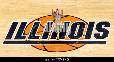 University of Illinois mascot Chief Illiniwek, portrayed by Dan Maloney perrforms at halftime of Illinois' basketball game against the University of Michigan at the University of Illinois Assembly Hall in Champaign, Il., February 21, 2007. Chief Illiniwek was retired by the University after the NCAA imposed sanctions for having a mascot portraying offensive use of American Indian imagery. (UPI Photo/Mark Cowan) Stock Photo
