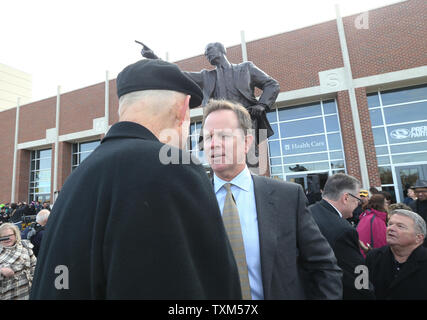 Former University of Missouri men's head basketball coach Norm Stewart talks with former player and former NBA player Jon Sundvold after dedication ceremonies of a new statue of Stewart outside of Mizzou Arena on the campus of the University of Missouri in Columbia, Missouri on November 10, 2017. Stewart, who coached Missouri from 1967 until 1999, coached his alma mater to a 634-333 record during his 32-year run.  Photo by Bill Greenblatt/UPI Stock Photo