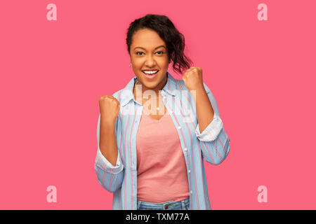 happy african american woman celebrating success Stock Photo