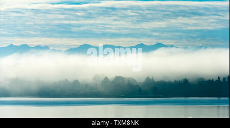 Morning fog over Puerto Varas on the shores of Lake Llanquihue, X Region de Los Lagos, Chile Stock Photo