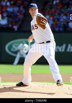 Texas Rangers starting pitcher Colby Lewis works against the San Diego ...