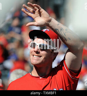 Texas Ranger Josh Hamilton (R), with his family, waves to the cheering fans  during the All-Star parade prior to the All-Star game on July 15, 2008 in  New York. Hamilton hit a