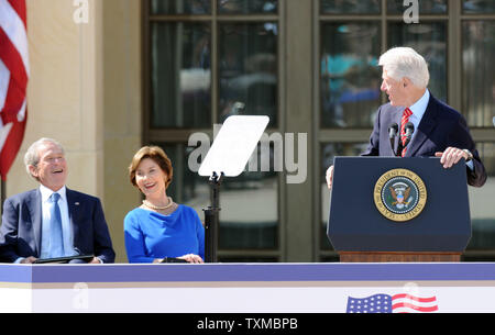 https://l450v.alamy.com/450v/txmbpb/former-president-bill-clinton-shares-a-laugh-with-president-george-w-and-laura-bush-during-the-dedication-of-bushs-presidential-library-in-dallas-on-april-25-2013-the-museum-located-on-the-campus-of-smu-in-dallas-features-a-permanent-exhibit-that-uses-artifacts-documents-photographs-and-videos-from-the-librarys-extensive-collection-to-capture-the-key-decisions-and-events-of-the-presidency-of-george-w-bush-upiian-halperin-txmbpb.jpg