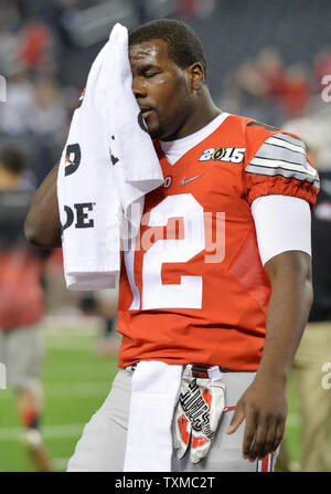 Ohio State Buckeyes quarterback Cardale Jones puts a towel on his face before the game against the Oregon Ducks at the College Football Playoff National Championship, in Arlington, Texas on January 12, 2015. Photo by Kevin Dietsch/UPI Stock Photo