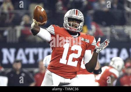 Ohio State Buckeyes quarterback Cardale Jones throws a pass in the first quarter against the Oregon Ducks at the College Football Playoff National Championship, in Arlington, Texas on January 12, 2015. Photo by Kevin Dietsch/UPI Stock Photo