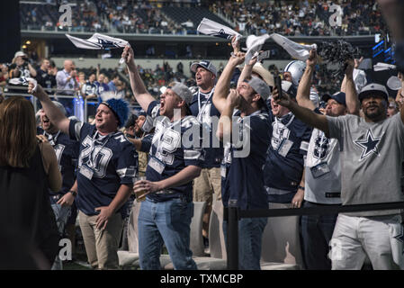 Dallas Cowboys fans cheer during an NFL Football game in Arlington ...