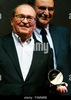 Director Sidney Lumet (L) holds an award honoring his distinguished career as French Cinematheque Director Serge Toubiana looks on at the 33rd American Film Festival of Deauville in Deauville, France on September 7, 2007.  Lumet received the award before the world premiere of his new film 'Before the Devil Knows You're Dead'.   (UPI Photo/David Silpa) Stock Photo