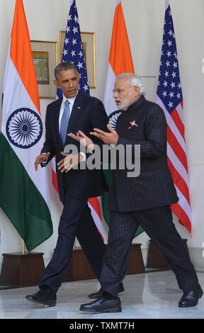 India's Prime Minister, Shri Narendra Modi, talks with US President  Barack Obama at Hyderabad House in New Delhi, India on January 25, 2015. President Obama is on a three day visit and will be the guest of honor at at India's Republic Day celebrations.    UPI Stock Photo