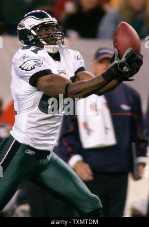 Philadelphia Eagles wide receiver Terrell Owens smiles at the fans in the  4th quarter. The Philadelphia Eagles defeated the New York Giants 27 to 6  at Giants Stadium in East Rutherford, New