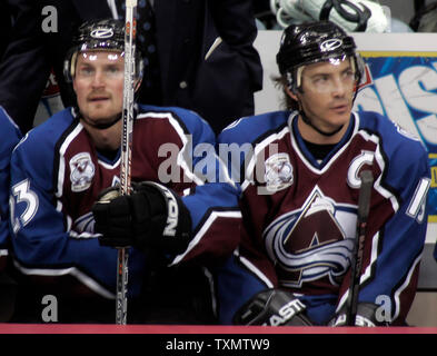 Colorado Avalanche head coach Joel Quenneville (R) wears his old Colorado  Rockies hockey jersey during press conference unveiling the NHL's and  Colorado Avalanche's newly designed Reebok Rbk EDGE uniforms at the Pepsi