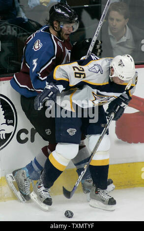 Colorado Avalanche right wing Steve Downie (17) works the puck along ...