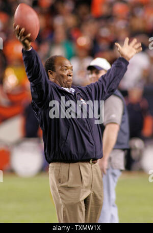 Ring of Fame Denver Bronco Billy Thompson holds aloft the game ball prior  to the start of the Denver Broncos hosting the New England Patriots during  the AFC divisional playoff game at Invesco Field in Denver on January 14,  2006. (UPI Photo/Gary C