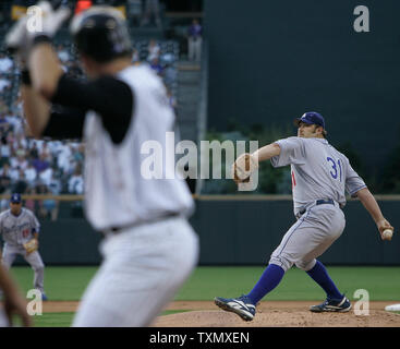 Colorado Rockies batter Todd Helton watches his sixth inning home run  against the San Francisco Giants at Coors Field in Denver on May 11, 2007.  Helton finished the game with a .397