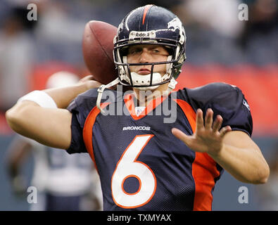 Denver Broncos quarterback Jay Cutler warms up at Invesco Field at