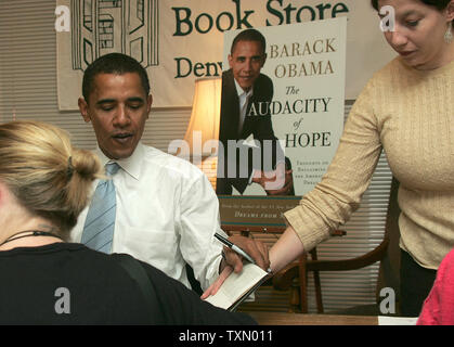 Illinois Democrat US Senator Barack Obama signs his book 'The Audacity of Hope at the Tattered Cover book store in Denver October 24, 2006.   Sen. Obama is in Colorado on a book signing tour as well as a political fund-raiser event.   Sen. Obama has expressed the possibility of his running for president in 2008.  (UPI Photo/Gary C. Caskey) Stock Photo
