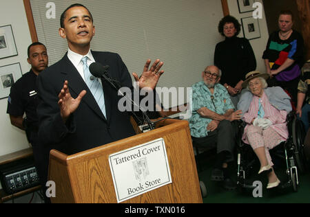 Illinois Democrat US Senator Barack Obama (second from left) makes a few remarks prior to signing copies of his book 'The Audacity of Hope' at the Tattered Cover book store in Denver October 24, 2006.  Senator Obama is in Colorado on his book tour and attending a fund raiser.  Senator Obama indicated the possibility of running for president in 2008 earlier in the week.   (UPI Photo/Gary C. Caskey) Stock Photo