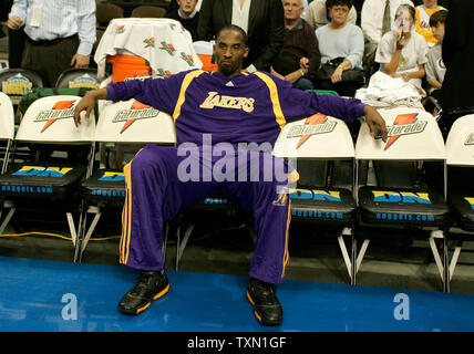 Los Angeles Lakers guard Kobe Bryant sprawls on the Lakers bench prior to game against the Denver Nuggets at the Pepsi Center in Denver April 9, 2007.  Denver currently holds the Western Conference's  sixth playoff spot with Los Angeles in seventh position.    (UPI Photo/Gary C. Caskey) Stock Photo