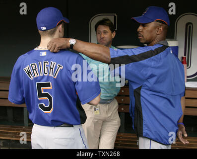 New York Mets pitcher John Maine watches the Colorado Rockies take batting  practice at Coors Field in Denver August 29, 2006. (UPI Photos/Gary C.  Caskey Stock Photo - Alamy