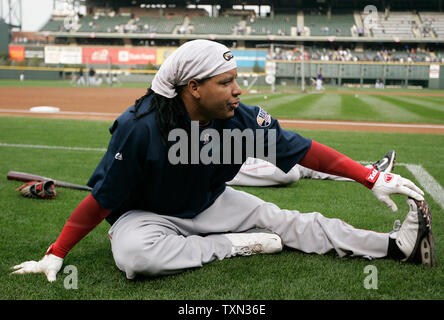 Red Sox left fielder Manny Ramirez rounds the bases after hitting a home run  off New York Yankees pitcher Randy Johnson, also sending Kevin Youkilis home  during the first inning at Fenway